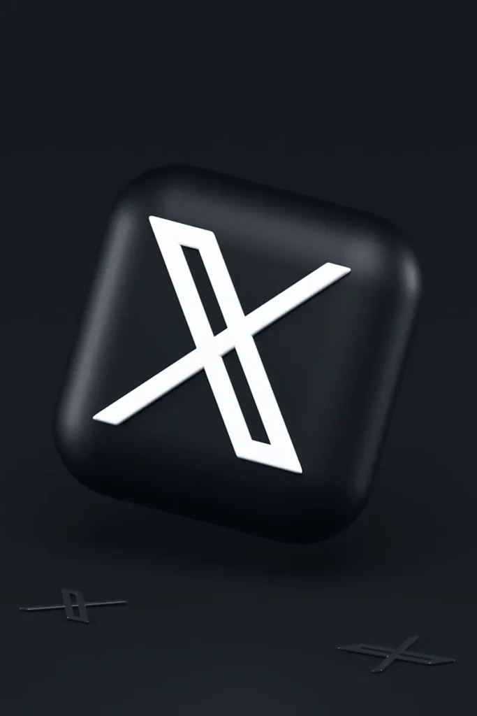 Logo sociální sítě X na černém pozadí